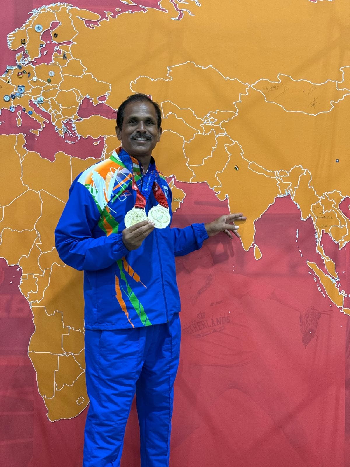 Coach Krishna Rao with medals at World Police Games 2025